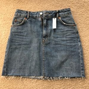 New Denim skirt from Topshop. Size 4.